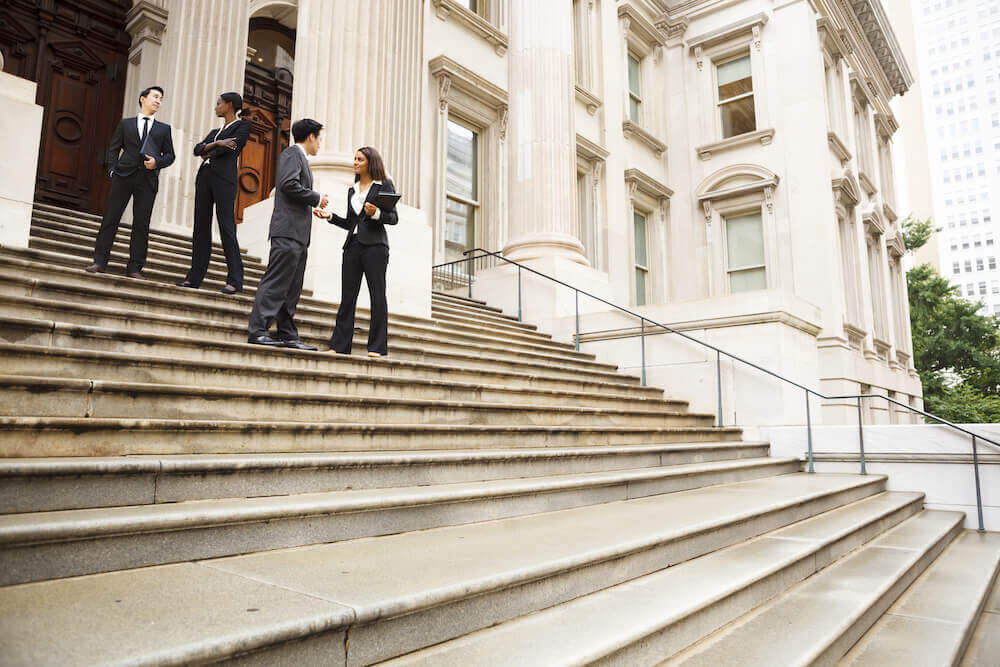 lawyers on courthouse steps