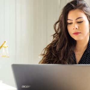 law student studying on laptop