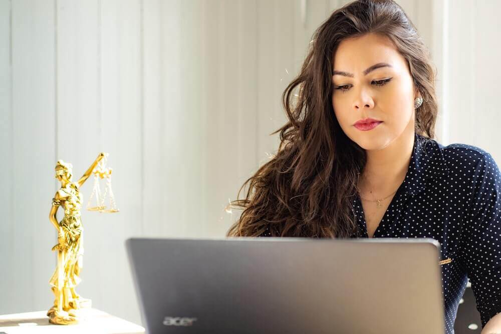 law student studying on laptop